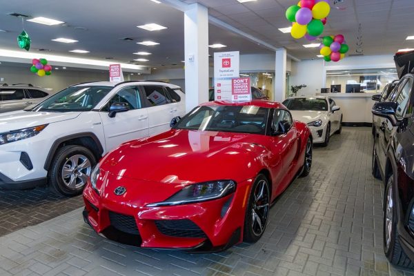 red supra front Plaza Toyota Car Dealership in Brooklyn, NY