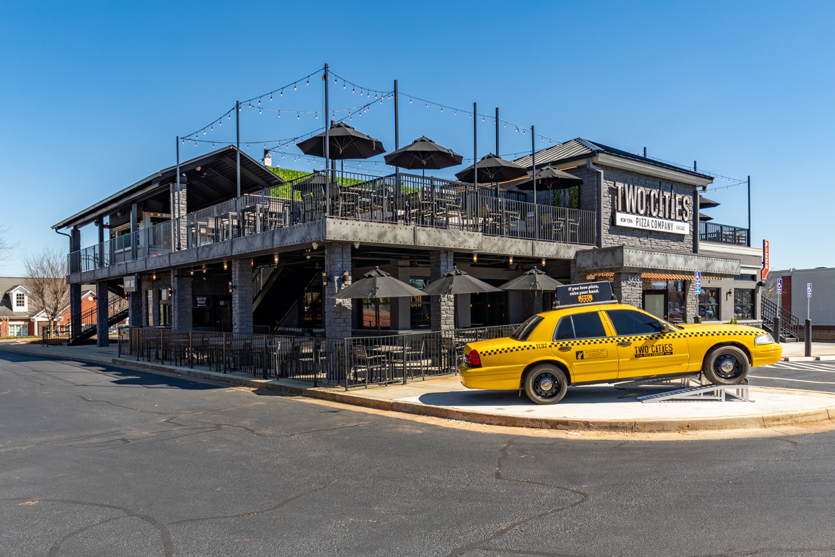 storefront taxi cab at Two Cities Pizza Co., Suwanee, GA Pizzeria