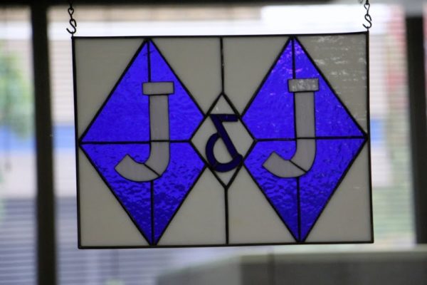 J & J Staffing Resources Swedesboro NJ stained glass company logo