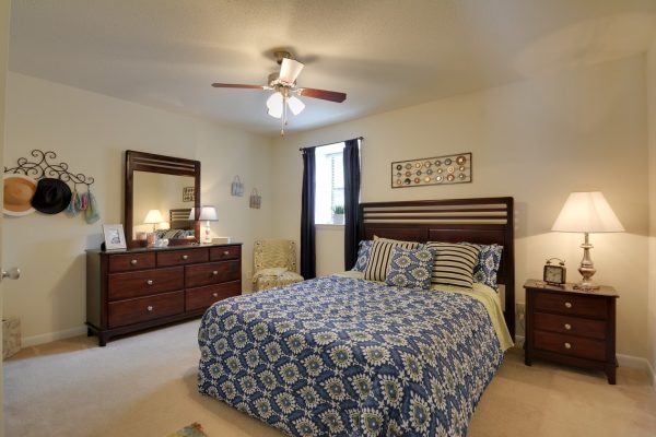 model bedroom at Cross Creek Cove Apartments in Fayetteville, NC