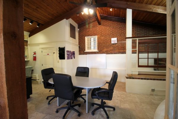 Keller Williams Realty Moorestown NJ meeting table exposed brick