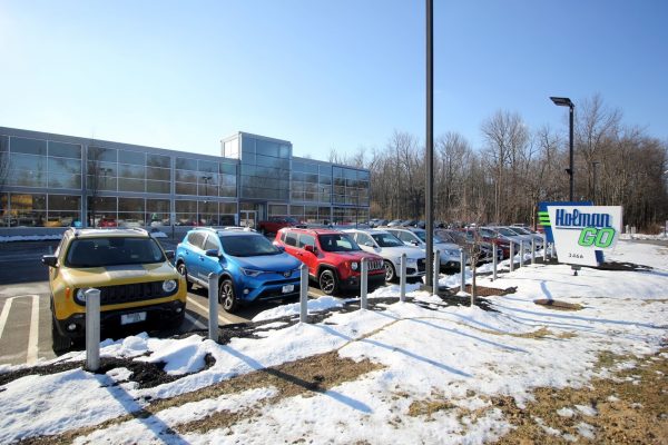 Holman GO Car dealership in Princeton, NJ store front car lot sign