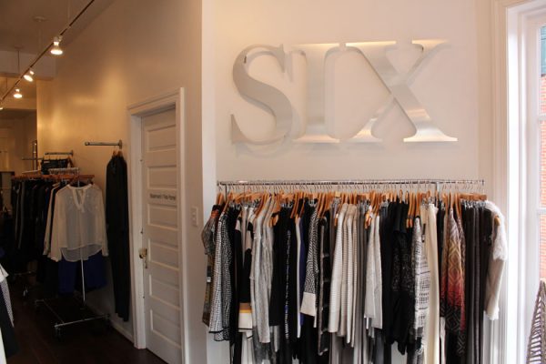 Six-on-East-Haddonfield-NJ-wall-display-logo-sign-clothes-on-racks