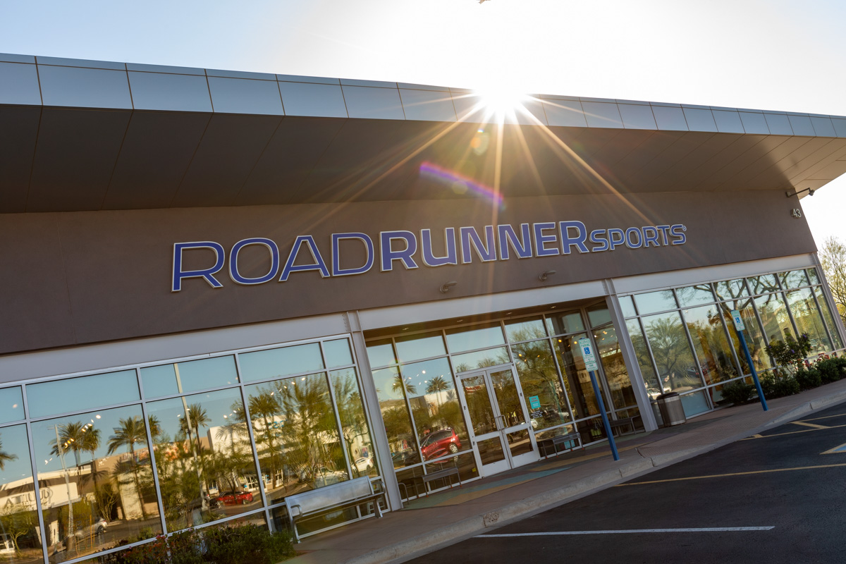 sun flare on storefront of Road Runner Sports, Tempe, AZ Running Shoe Store