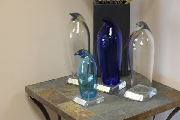 Crane Communications Inc Bala Cynwyd PA marketing award glass penguins