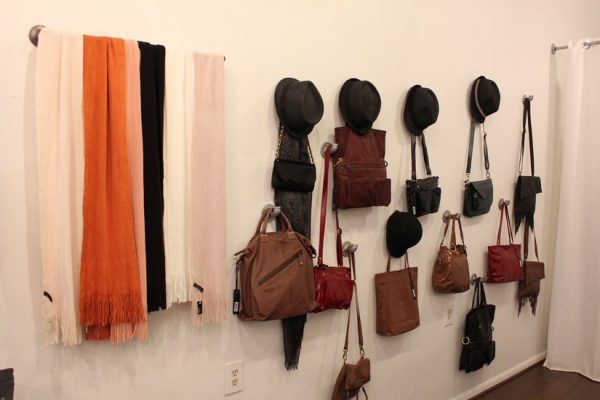 Six-on-East-Haddonfield-NJ-hanging-scarves-bags-purses-hats-wall-display