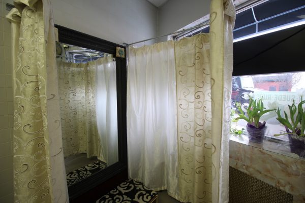 G&G Cleaners in Philadelphia, PA alteration fitting room curtain and mirror