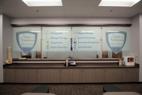 NJ Spine and Wellness Freehold, NJ Physical Therapy Clinic glass decal sign