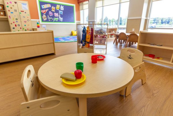 toy tea set on circle table at Lightbridge Academy Day Care in Somerset, NJ