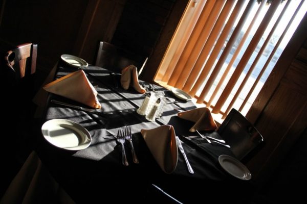 Neil Michaels Steakhouse Atlantic Highlands NJ table seating chiaroscuro lighting