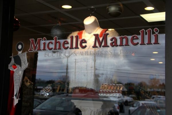 Michelle's Manelli Cherry Hill NJ boutique shop store front window display logo sign