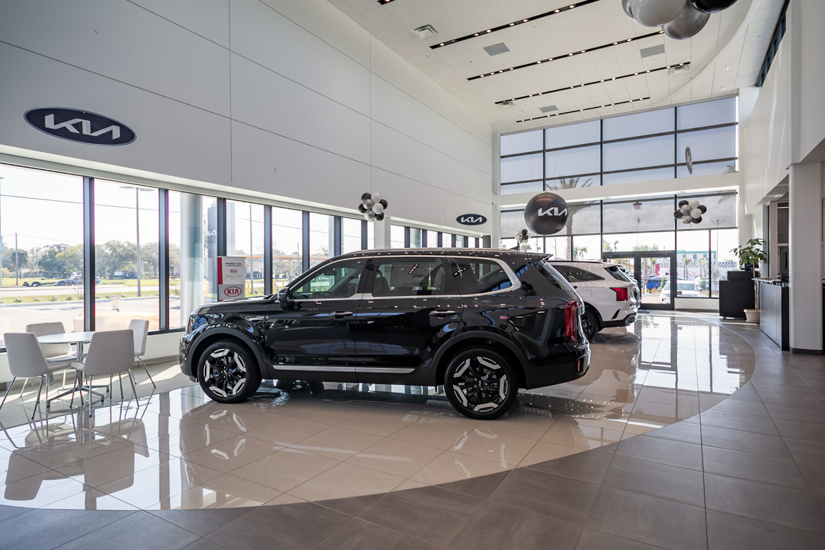 black suv in showroom of Friendly Kia, New Port Richey, FL 360 Virtual Tour for Car Dealership