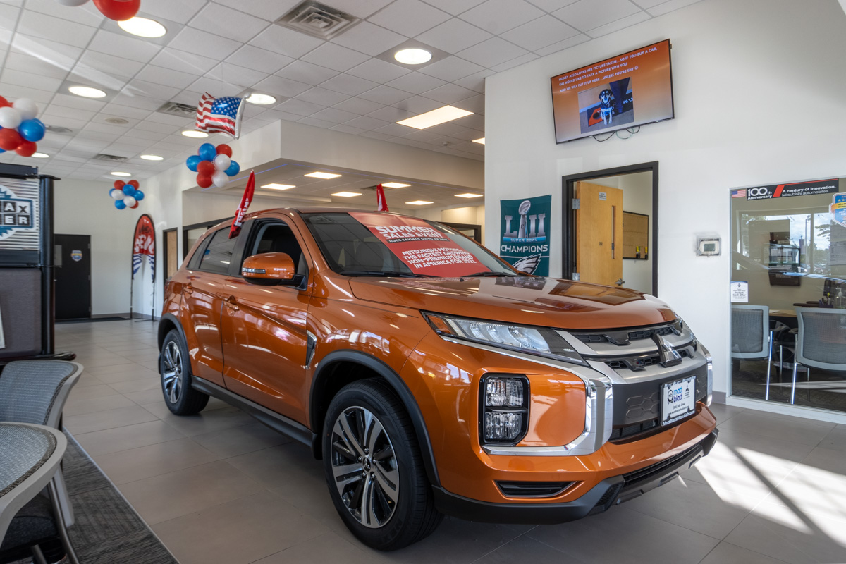 orange crossover suv at Matt Blatt Mitsubishi, Glassboro, NJ 360 Virtual Tour for Car Dealership