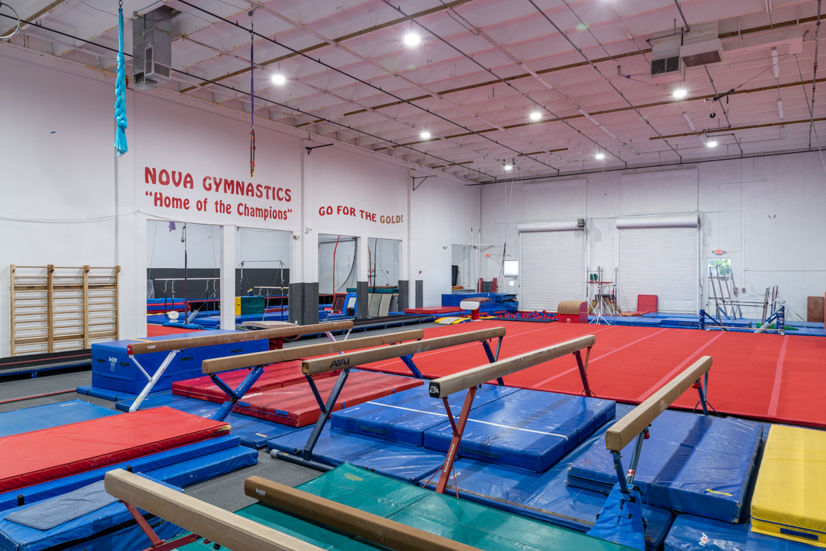 gym floor and balance beams at Nova Gymnastics, Davie, FL 360 Virtual Tour for Gymnastics center