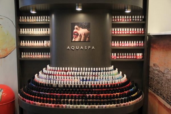 AquaSpa Day Spa and Nail Boutique Marlboro Morganville NJ opi nail polish display lips mouth