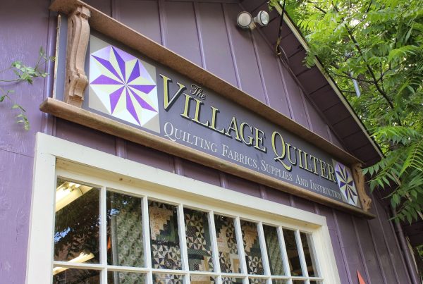 front sign of The Village Quilter – Mount Holly, NJ – retail store