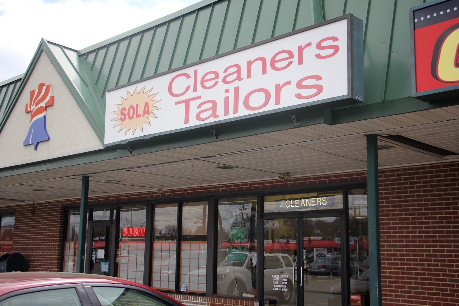 store front Sola Cleaners Cherry HIll NJ