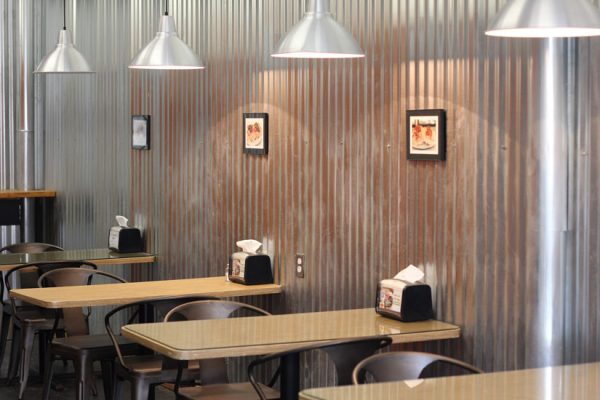 Marie's-Sandwich-Shop-Haddonfield-NJ-interior-seating-tables-aluminum-wall-corrugated-metal