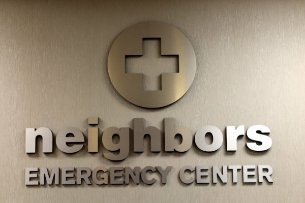 Neighbors Emergency Center Kingwood TX logo sign