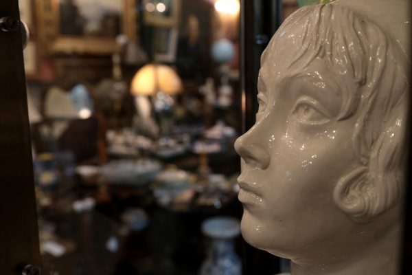 A Galerie Alexandria, VA Antique Store porcelain bust of girl