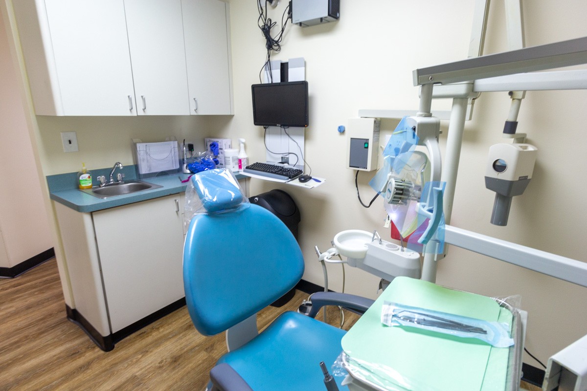 patient exam room dentist chair at Concerned Dental Care of Westchester in Yonkers, NY
