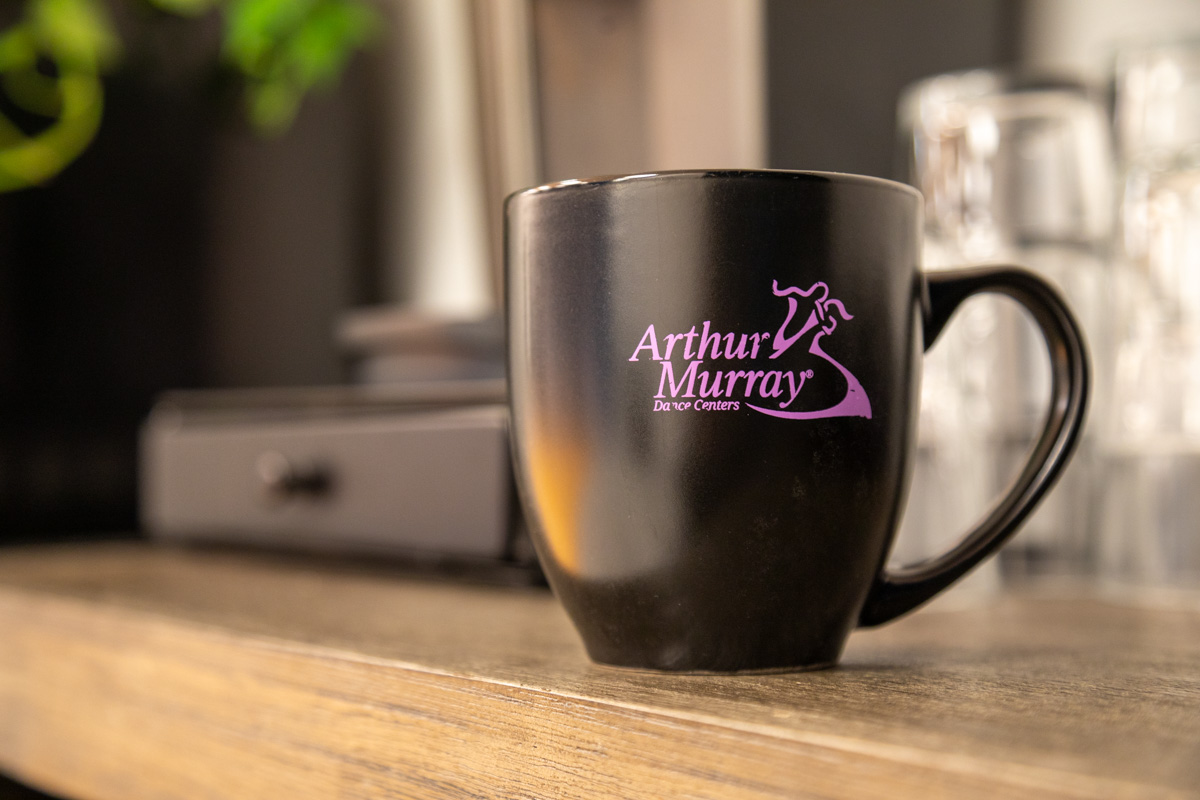 logo on black cup at Arthur Murray Dance Studio of Carmel, IN