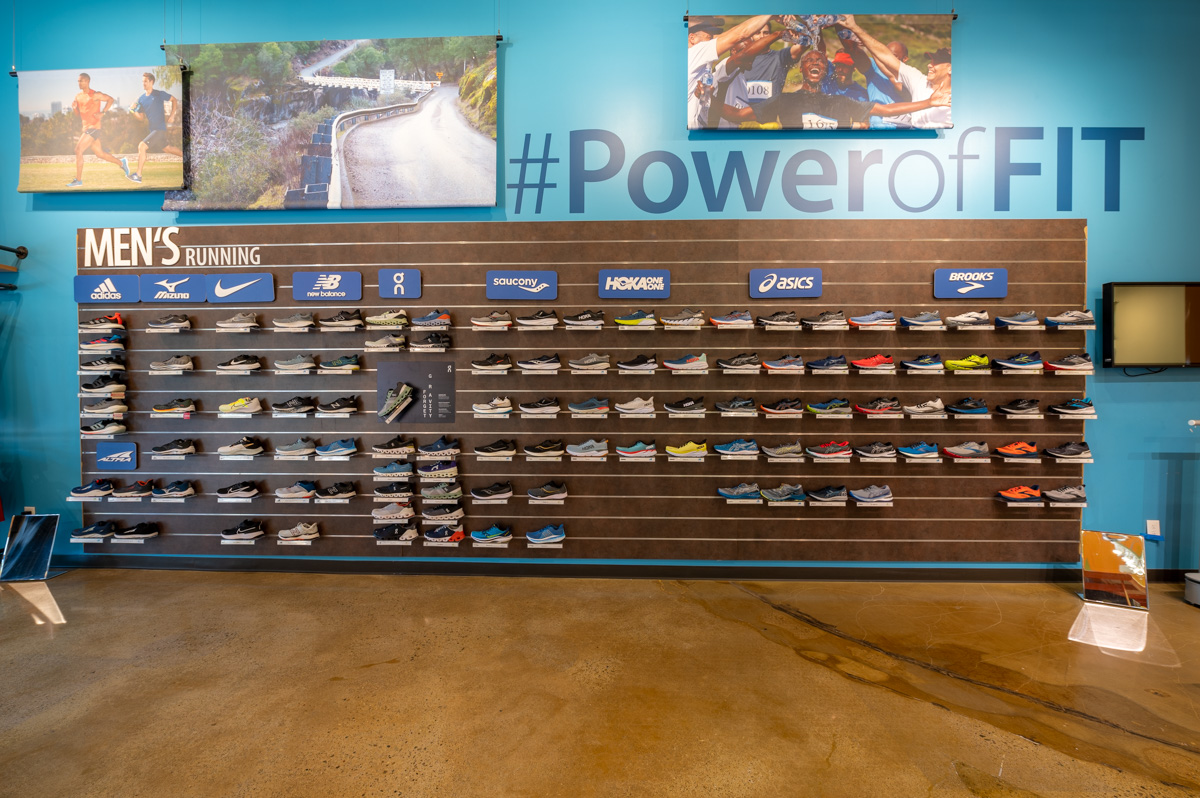 wall display of sneakers at Road Runner Sports, Concord, CA Running Shoe Store