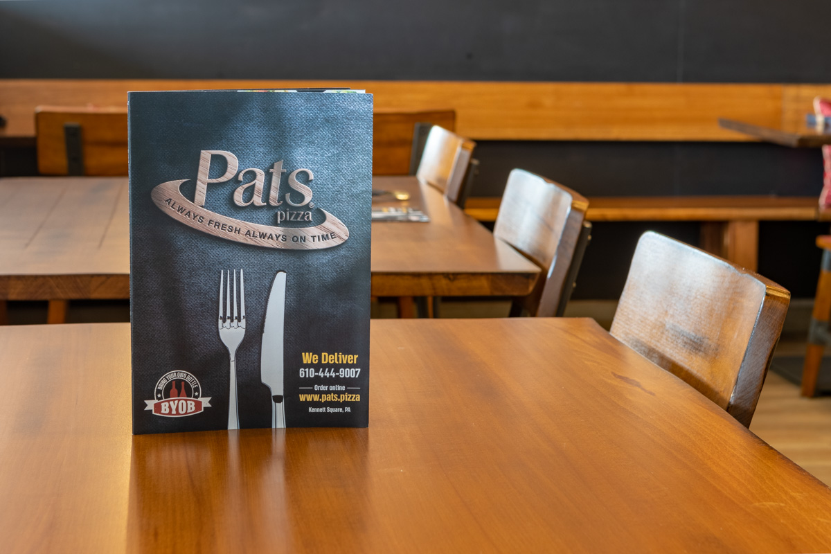 print menu on table at Pat's Pizza Kennett Square, PA 360 Virtual Tour for Pizzeria