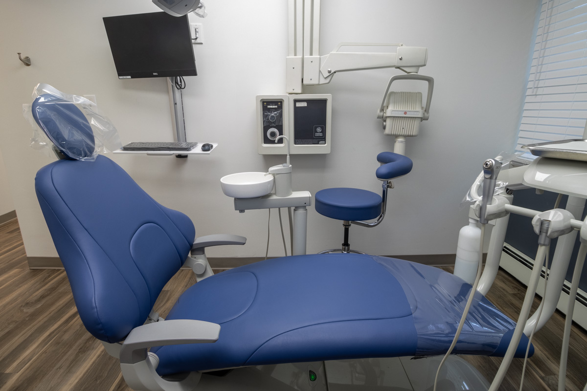 dental exam chair at Concerned Dental Care of Port Jefferson, NY 360 Virtual Tour for Dentist