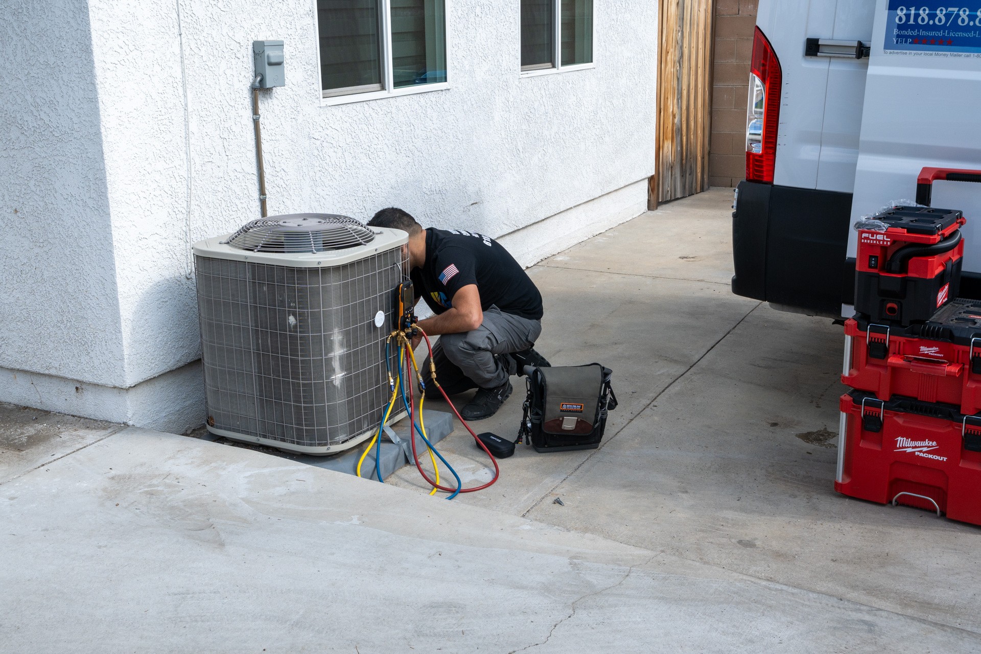 handyman fixing ac unit for Unity Construction Heating & Air, Woodland Hills, CA 360 Virtual Tour for Air conditioning repair service