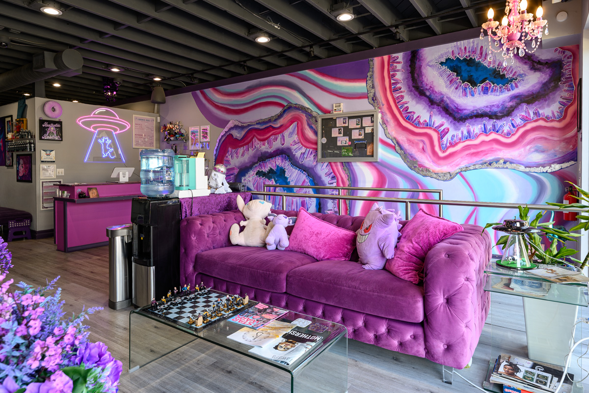 sofa and wall mural at Aesthetic Ambition Piercing and Fine Jewelry, Santa Monica, CA 360 Virtual Tour for Body piercing shop