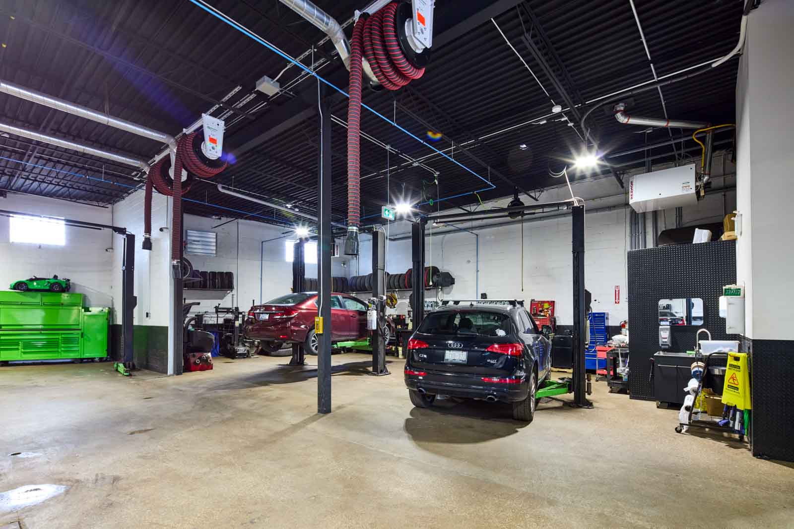 reparing cars on hydraulic lifts at My Neighbourhood Mechanic, Toronto, Ontario Canada 360 Virtual Tour for Auto Mechanic